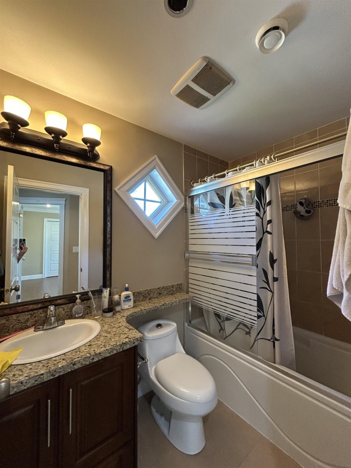 Photo 9 at 8463 Oak Street, Marpole, Vancouver West