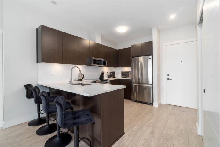 Photo 2 at 409 - 1633 Tatlow Avenue, Pemberton NV, North Vancouver