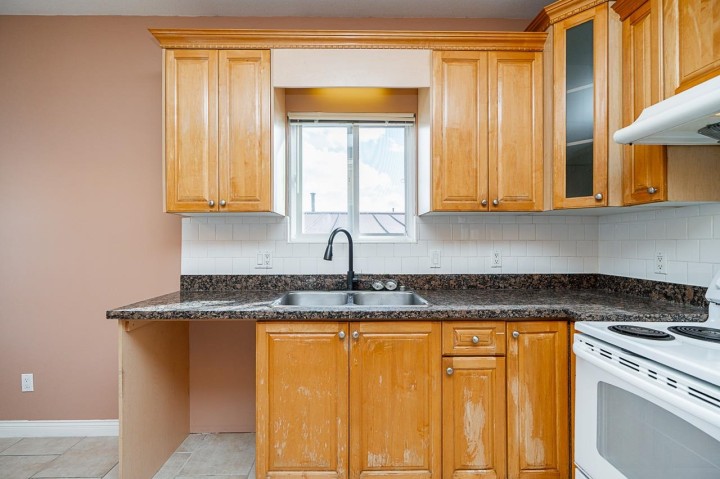 Photo 9 at 2887 E Georgia Street, Renfrew VE, Vancouver East