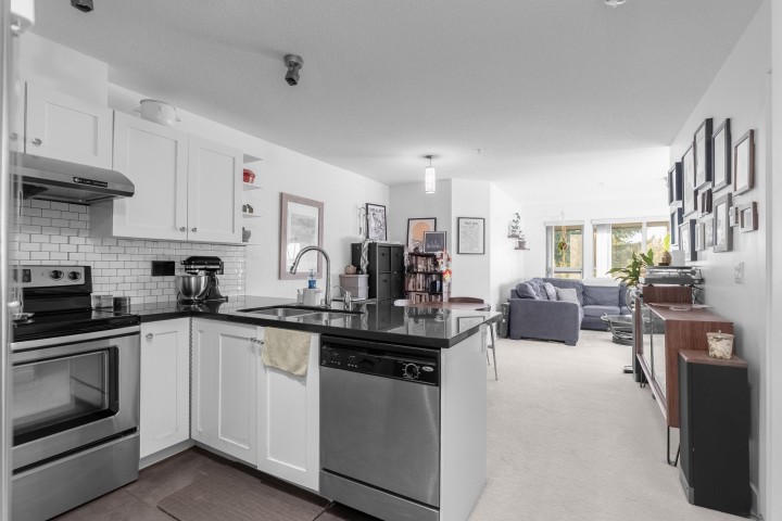 Photo 1 at 305 - 4550 Fraser Street, Fraser VE, Vancouver East