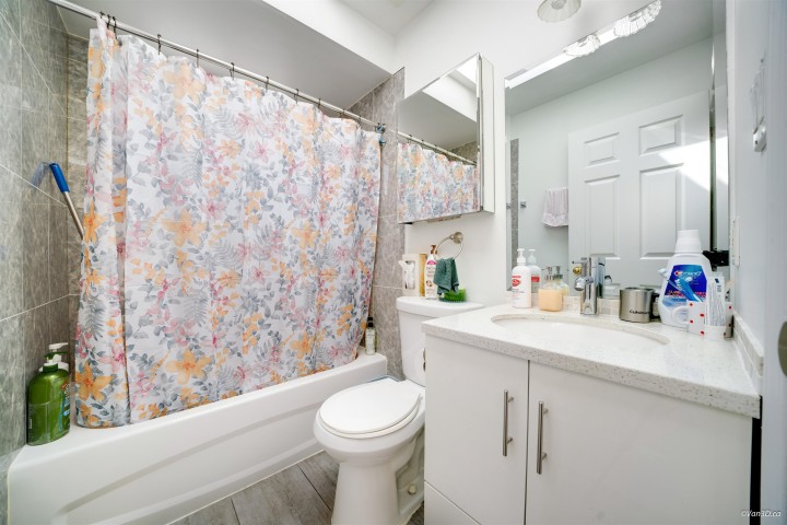 Photo 9 at 4502 Nanaimo Street, Collingwood VE, Vancouver East