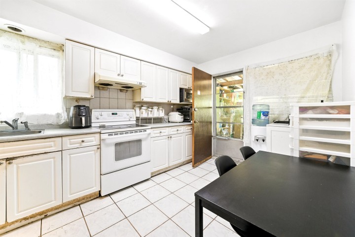 Photo 9 at 4987 Hoy Street, Collingwood VE, Vancouver East