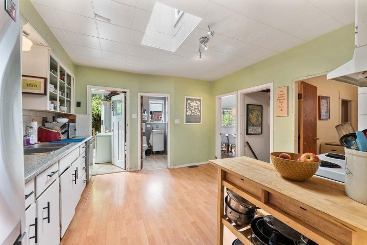 Photo 12 at 4225 John Street, Main, Vancouver East