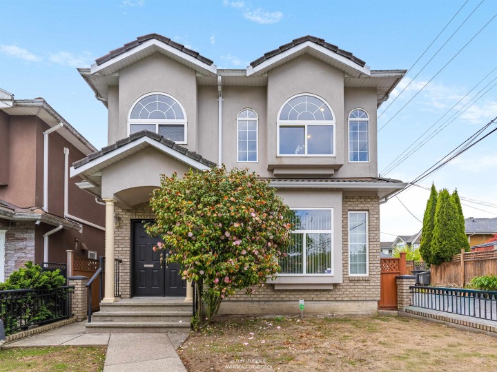 Photo 1 at 5323 Dumfries Street, Knight, Vancouver East