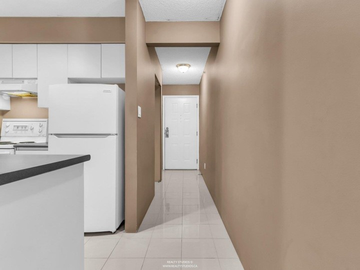 Photo 2 at 206 - 3489 Ascot Place, Collingwood VE, Vancouver East