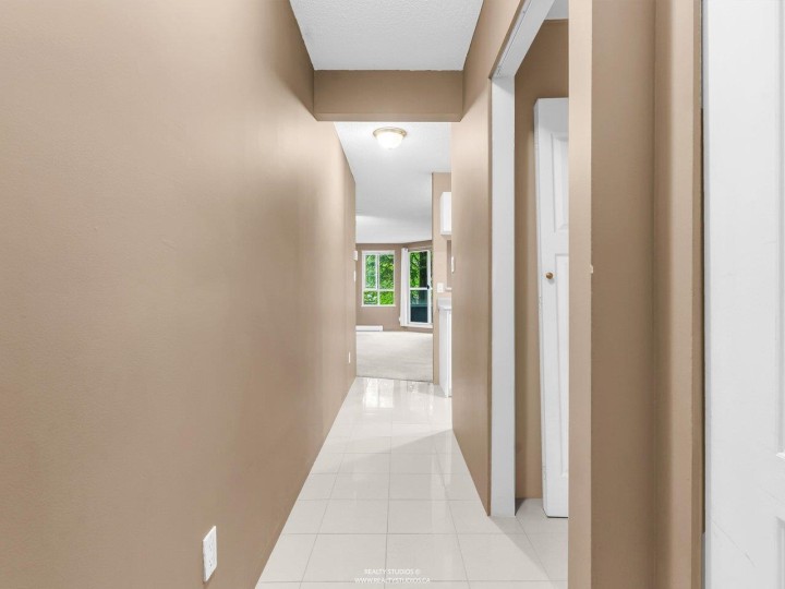 Photo 3 at 206 - 3489 Ascot Place, Collingwood VE, Vancouver East