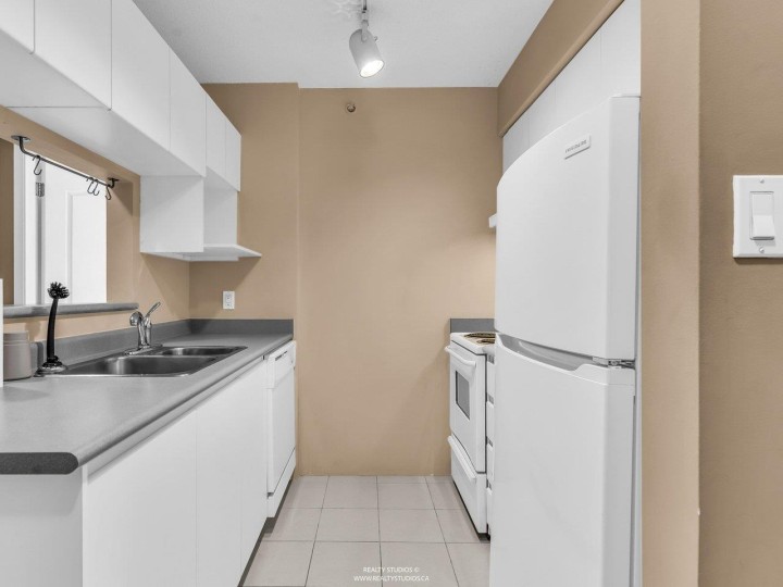 Photo 5 at 206 - 3489 Ascot Place, Collingwood VE, Vancouver East
