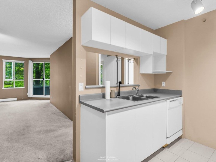 Photo 4 at 206 - 3489 Ascot Place, Collingwood VE, Vancouver East