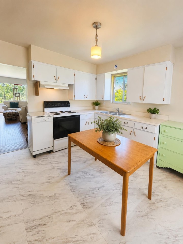 Photo 2 at 3141 E Broadway, Renfrew VE, Vancouver East