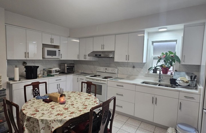 Photo 3 at 5350 Cecil Street, Collingwood VE, Vancouver East