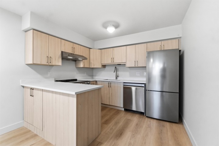 Photo 1 at 305 - 2928 Commercial Drive, Grandview Woodland, Vancouver East