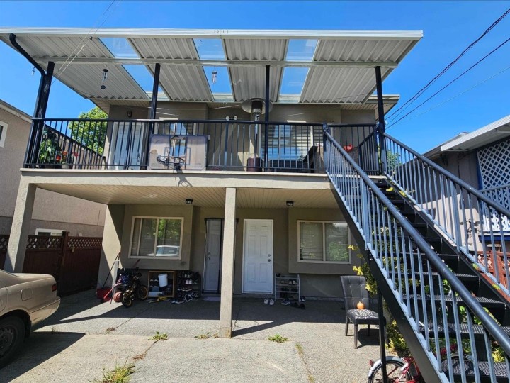 Photo 2 at 6128 St Catherine Street, Fraser VE, Vancouver East