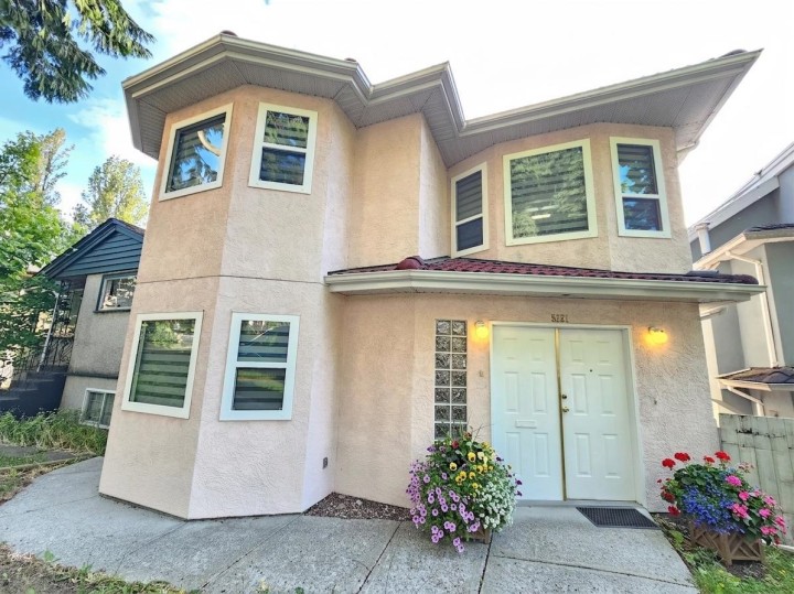 Photo 1 at 5521 Dundee Street, Collingwood VE, Vancouver East