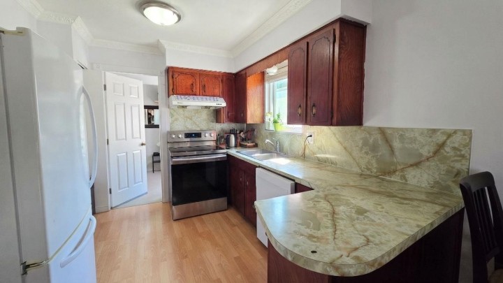 Photo 3 at 5075 Payne Street, Collingwood VE, Vancouver East