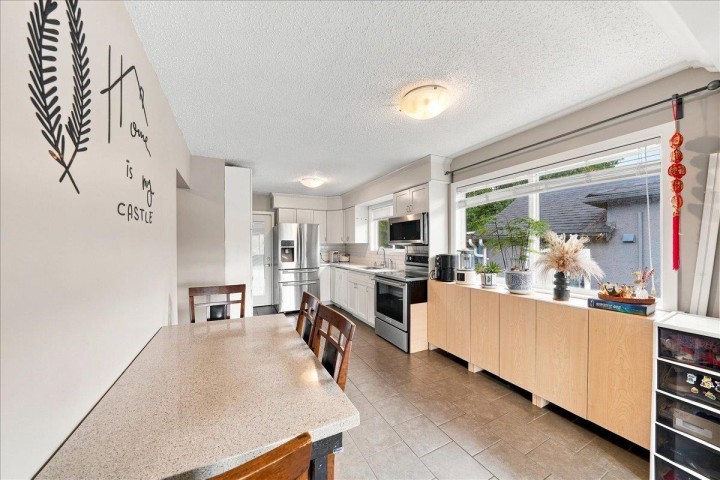 Photo 5 at 4820 Moss Street, Collingwood VE, Vancouver East