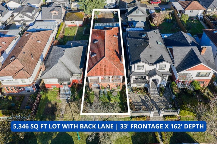 Photo 1 at 557 E 58th Avenue, South Vancouver, Vancouver East