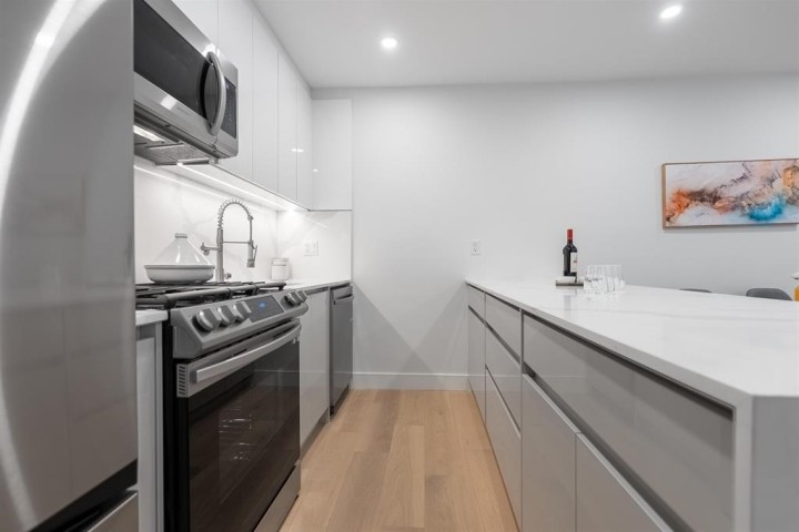Photo 8 at 2881 E Georgia Street, Renfrew VE, Vancouver East