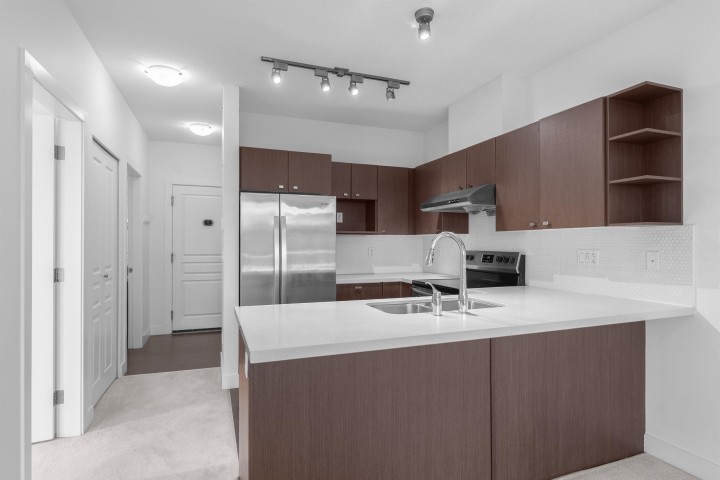 Photo 5 at 407 - 4550 Fraser Street, Fraser VE, Vancouver East