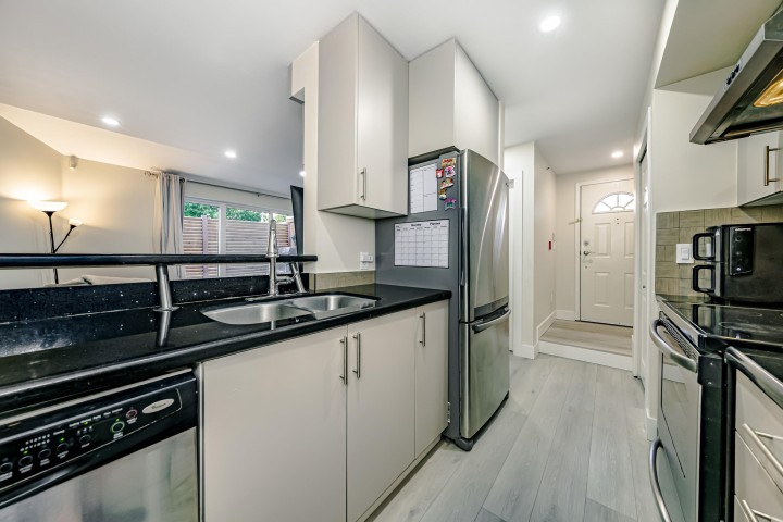Photo 9 at 1 - 1328 W 73rd Avenue, Marpole, Vancouver West