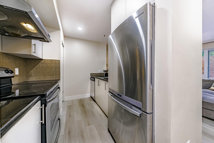 Photo 11 at 1 - 1328 W 73rd Avenue, Marpole, Vancouver West