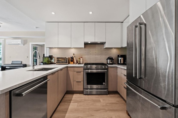 Photo 4 at 409 - 8508 Rivergrass Drive, South Marine, Vancouver East
