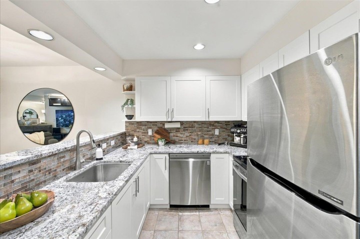 Photo 13 at 8416 Millstone Street, Champlain Heights, Vancouver East