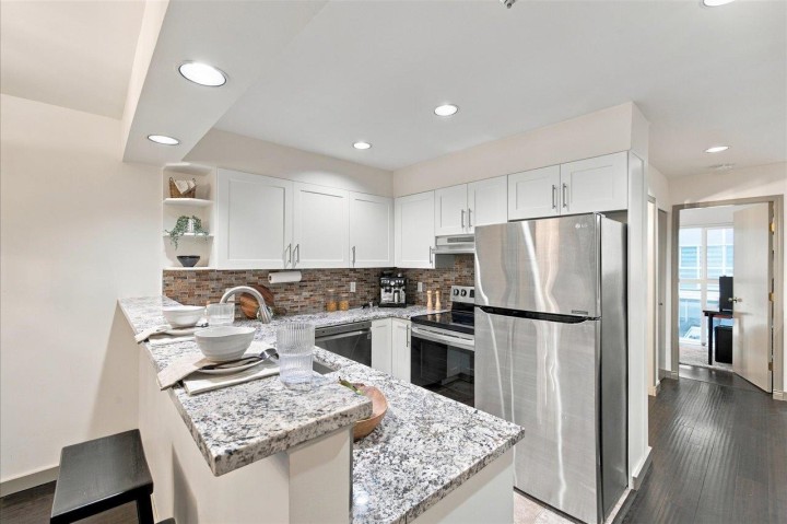 Photo 12 at 8416 Millstone Street, Champlain Heights, Vancouver East